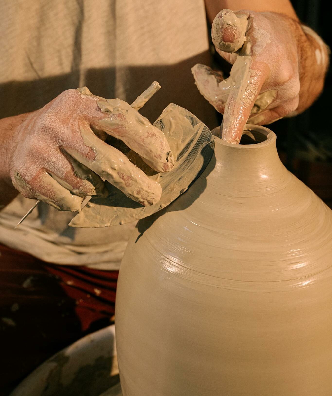 Person Making Clay Pot